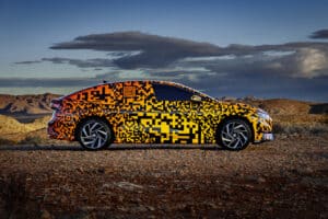 On the road to the world premiere: first appearance of the new ID.7 sedan with digital camouflage
