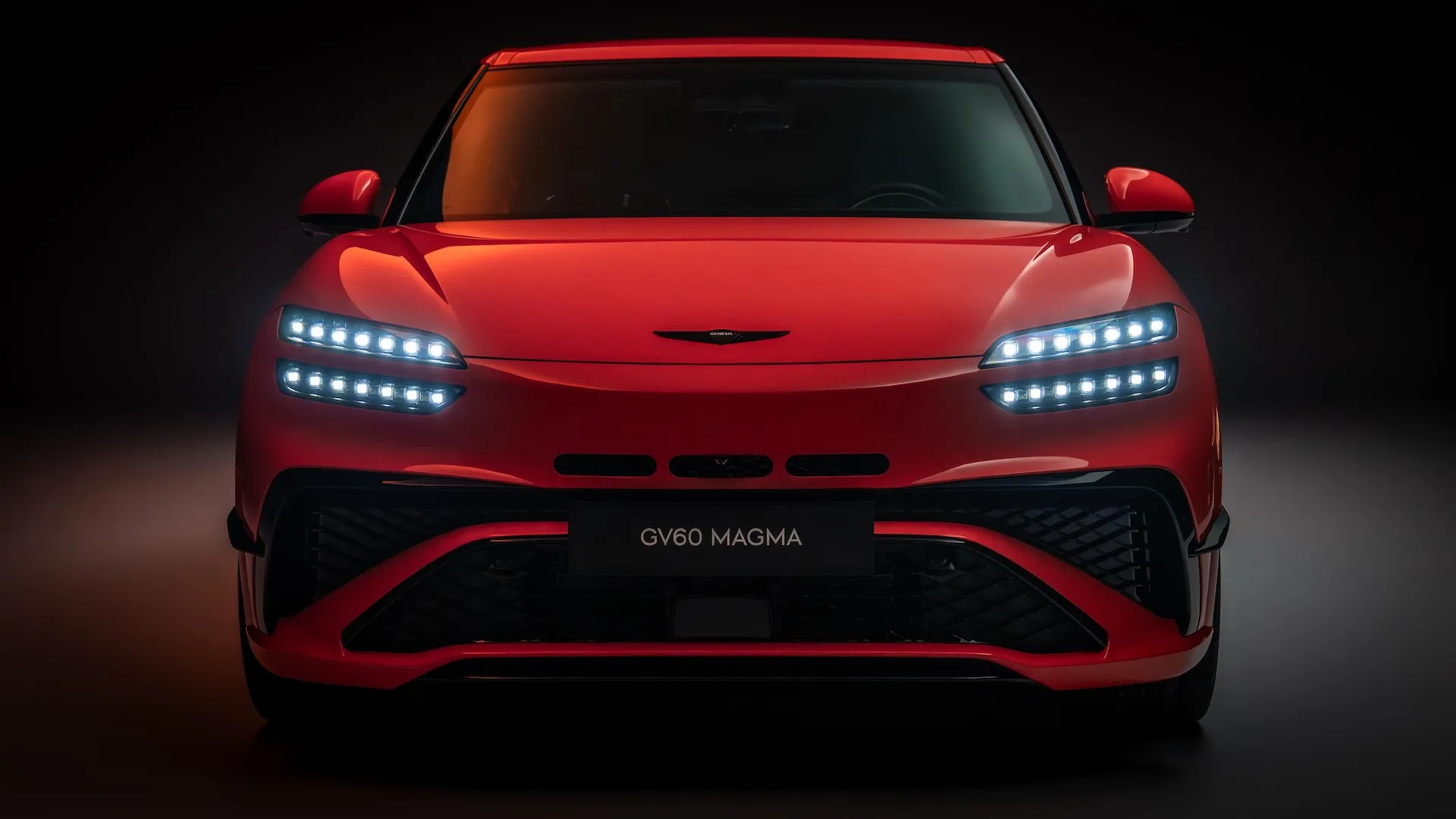 Genesis GV60 Magma high-performance electric SUV shown in Magma Orange, the brand's first Magma-line model priced from £75,915.