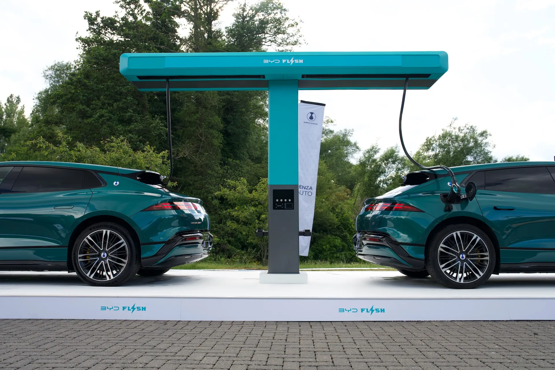A DENZA Z9 GT connected to a BYD FLASH Charging unit during the technology's first UK demonstration at BYD's Uxbridge headquarters