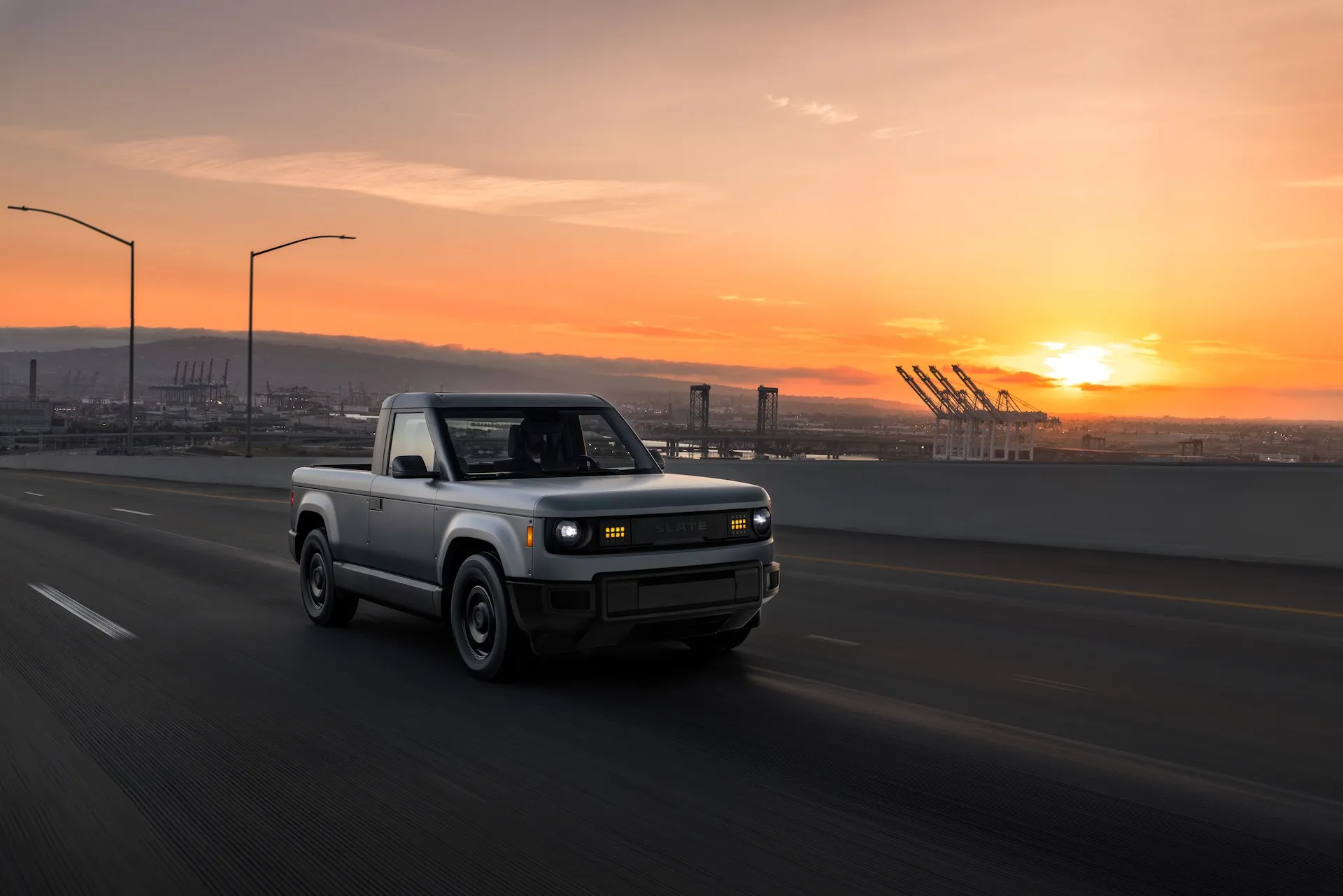 2027 Slate Truck electric pickup, priced at $24,950, shown in profile.