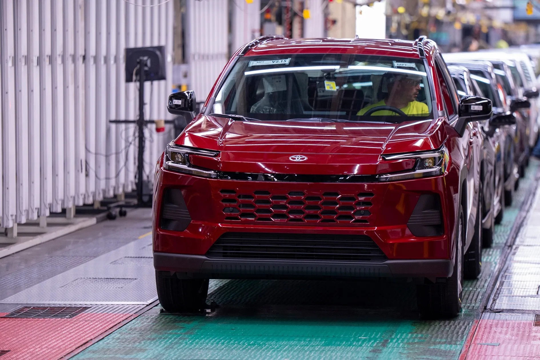 A red Toyota RAV4 Hybrid on the assembly line at Toyota's Georgetown, Kentucky plant.