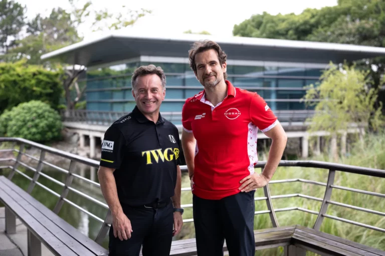 Tommaso Volpe of Nissan Formula E Team and Roger Griffiths of Andretti Formula E shake hands to mark the GEN4 powertrain supply agreement