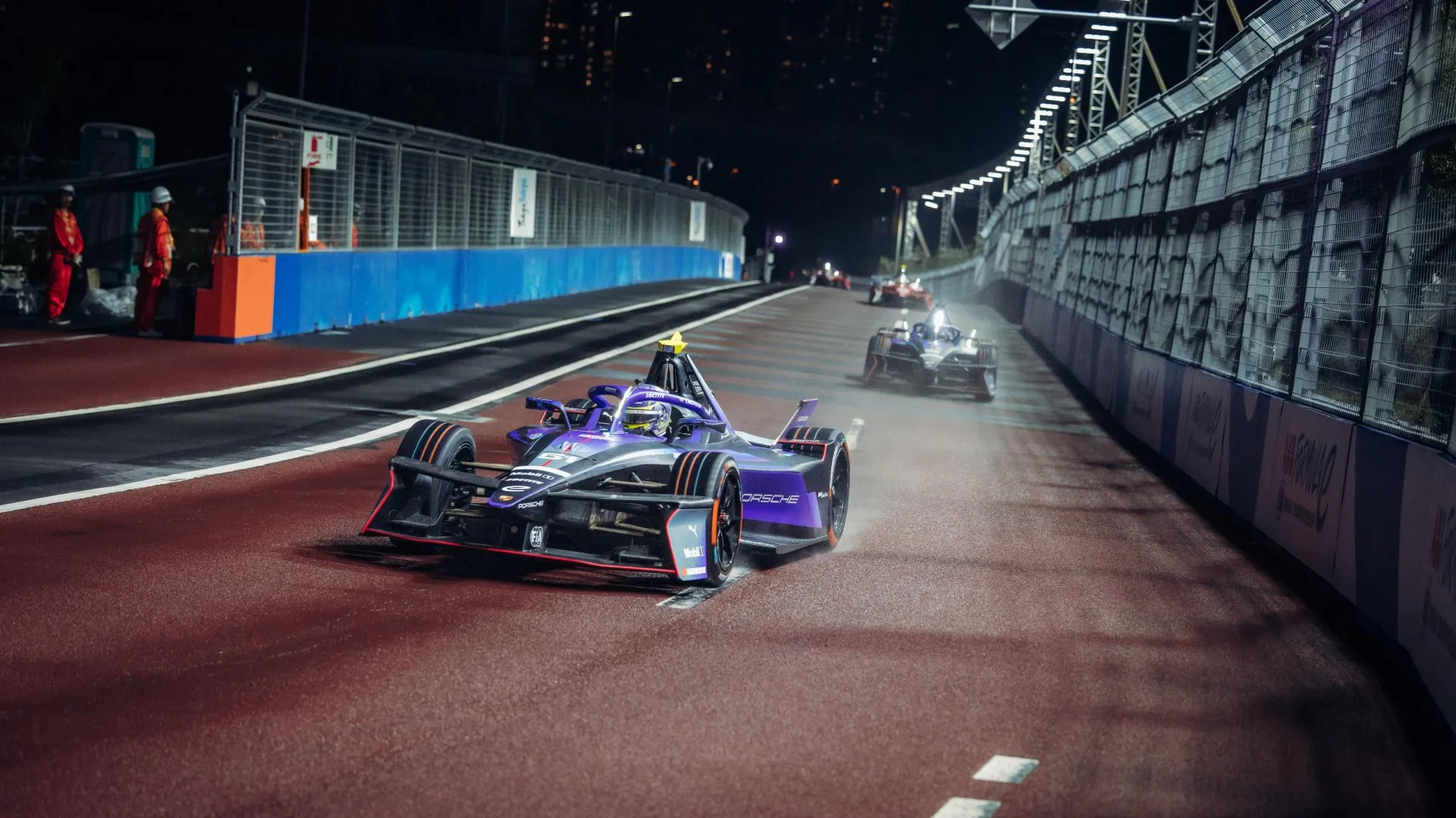 Porsche 99X Electric race cars of Nico Müller and Pascal Wehrlein at the 2026 Tokyo E-Prix, where Porsche clinched the Formula E Manufacturers' World Championship