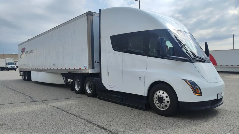 Tesla Semi Long Range tractor pulling a Paper Transport trailer during Chicago evaluation