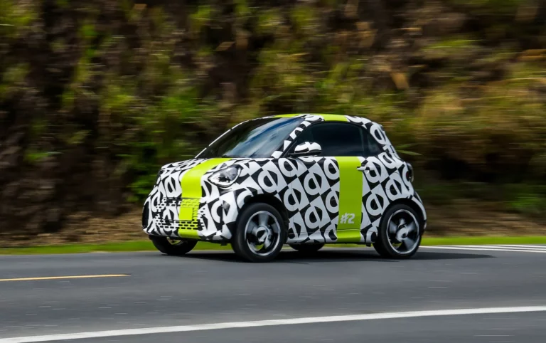 smart #2 prototype in black-and-white camouflage livery undergoing pre-production testing ahead of Paris Motor Show premiere