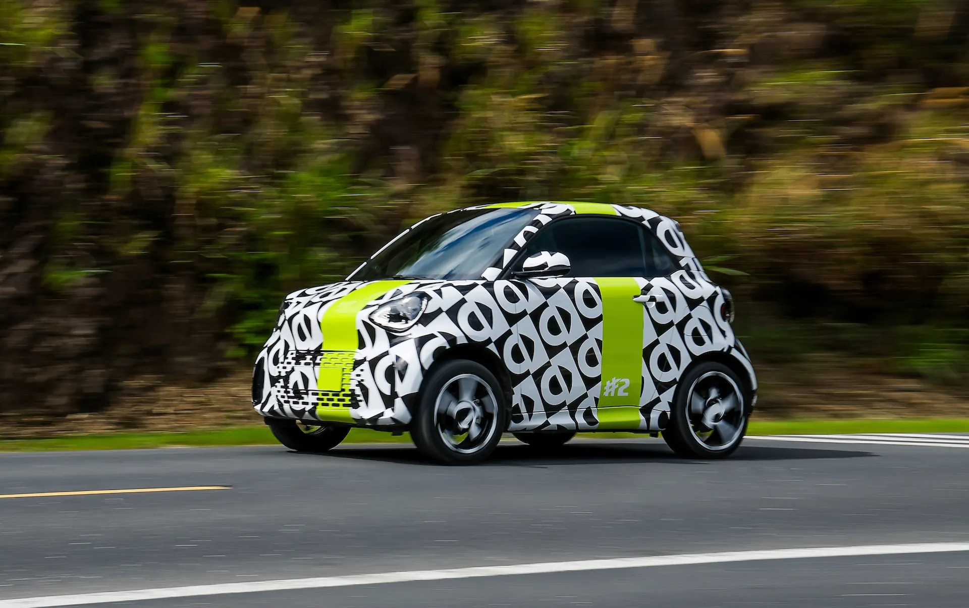 smart #2 prototype in black-and-white camouflage livery undergoing pre-production testing ahead of Paris Motor Show premiere