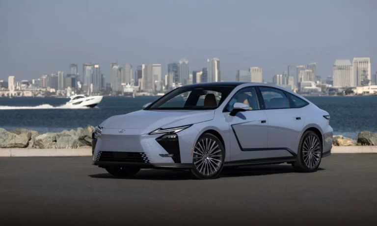 2027 Lexus ES 350e battery-electric luxury sedan in Wavelength paint, front three-quarter view