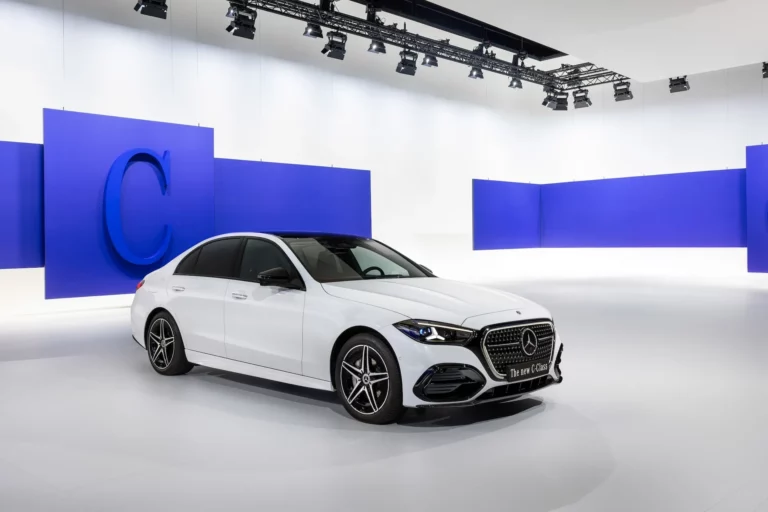 New Mercedes-Benz C-Class sedan with illuminated radiator grille, shown ahead of plug-in hybrid order opening