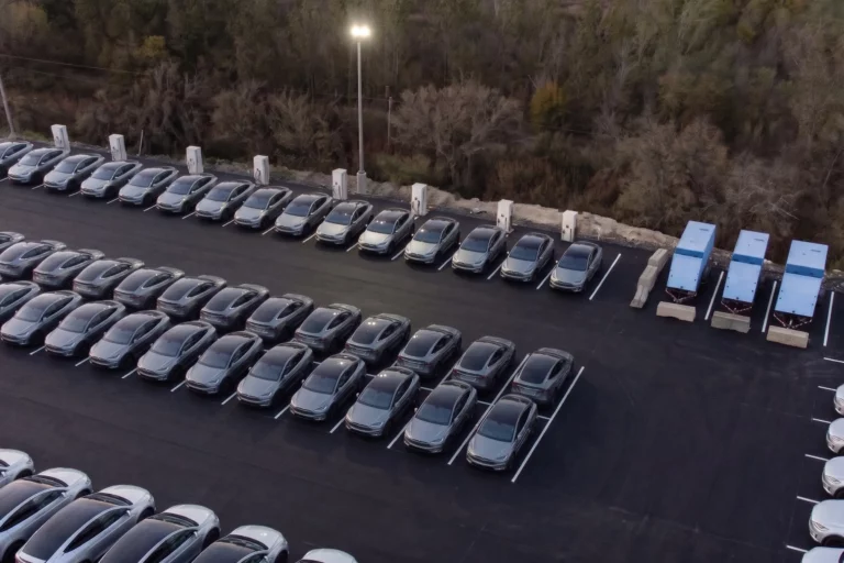 SparkCharge mobile battery energy storage unit delivering off-grid power to a commercial vehicle fleet depot