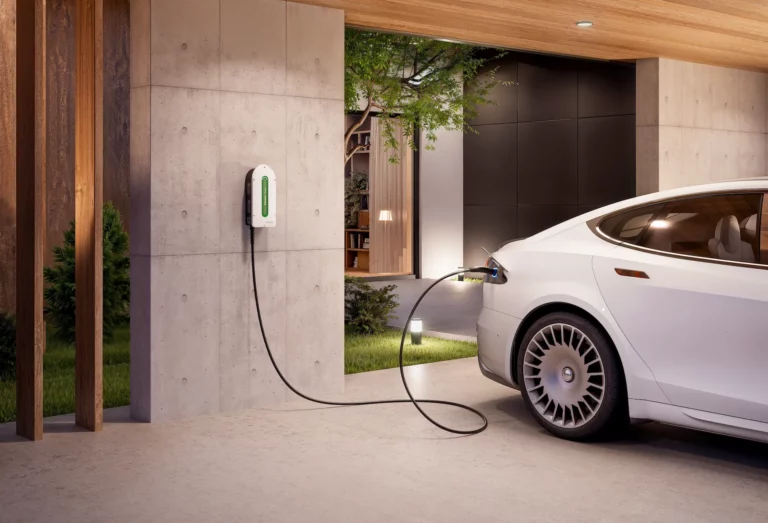 Schneider Charge residential EV charger wall-mounted with charging cable connected to an electric vehicle