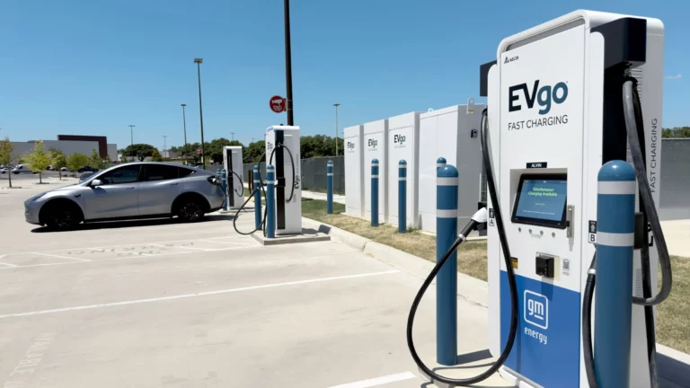 EVgo fast charging stalls installed at a Brixmor shopping center parking lot