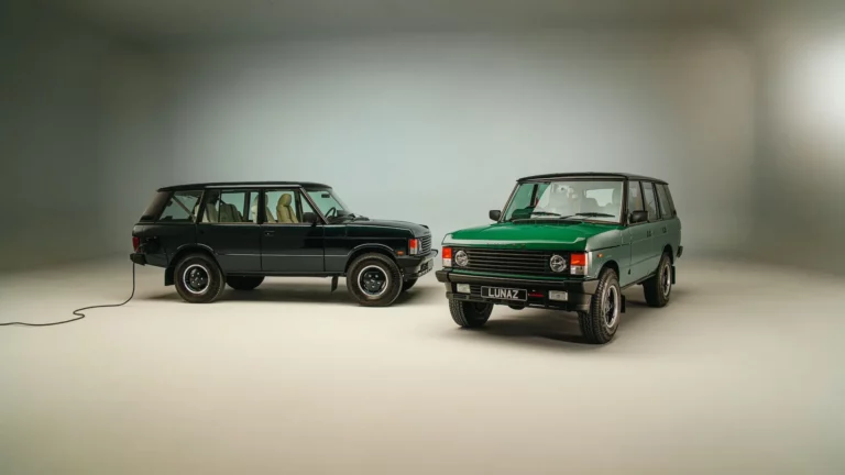 Two Lunaz Range Rover Classic restomods, one plugged into an electric charger