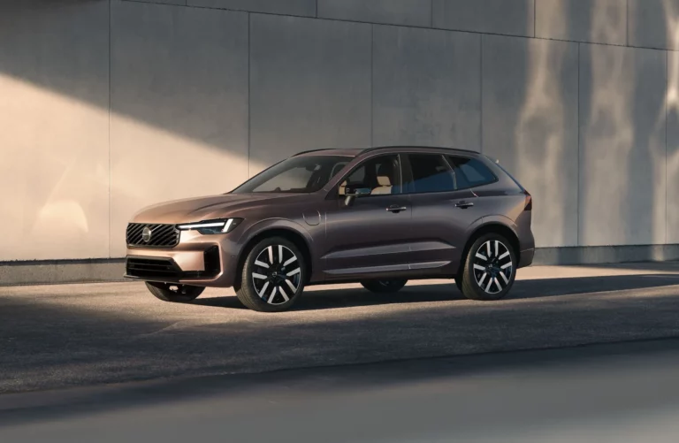 New Volvo XC60 long-range plug-in hybrid SUV parked beneath a concrete overpass