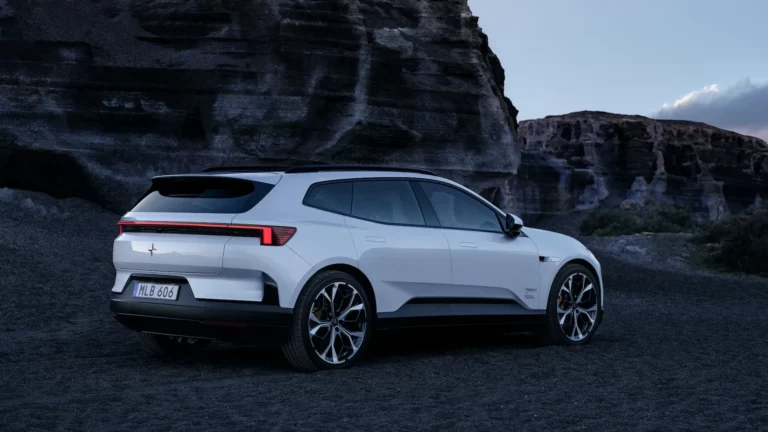 Polestar 4 SUV in Aurora silver green showing redesigned rear end and full-length roof rails