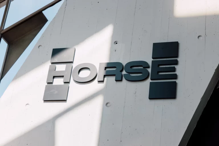 Horse Powertrain North America office ribbon-cutting ceremony in Michigan with company executives and local officials