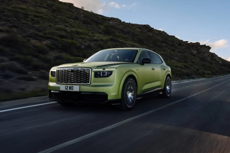 Bentley Torcal electric SUV front three-quarter view showing the illuminated diamond grille