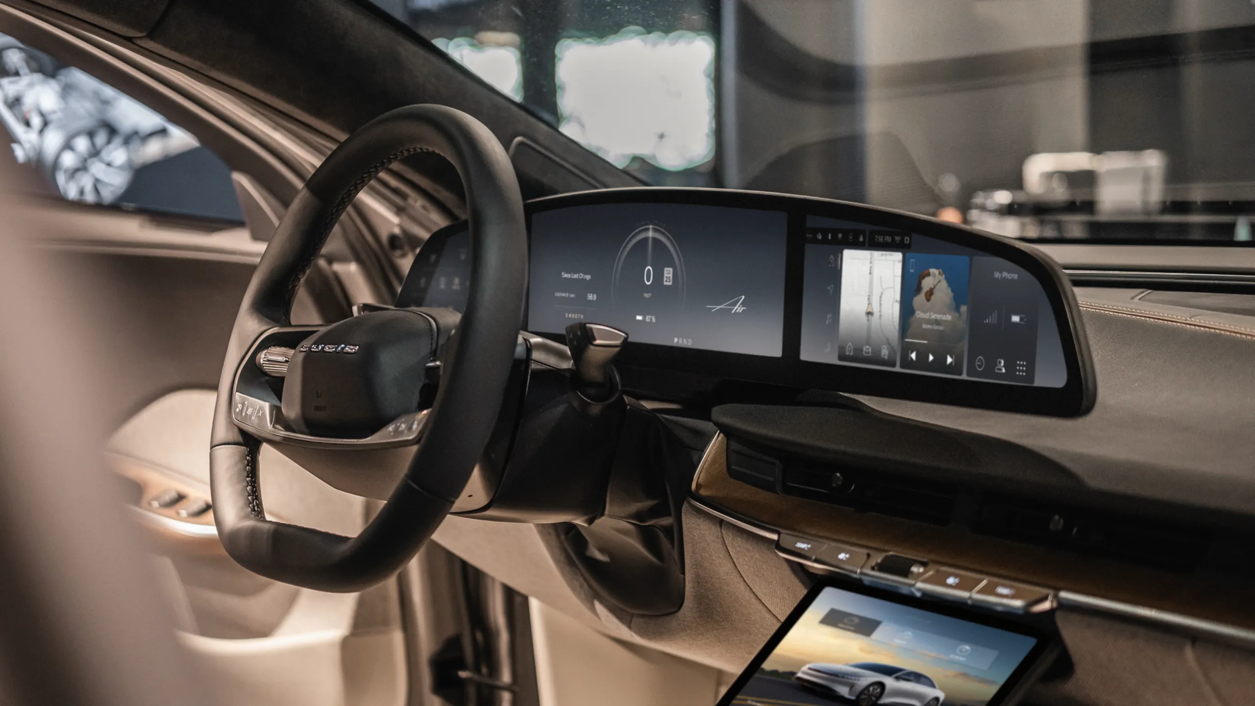 Lucid Air UX 3.0 interface on the Lucid Air's curved Cockpit Panel and center Pilot Panel displays