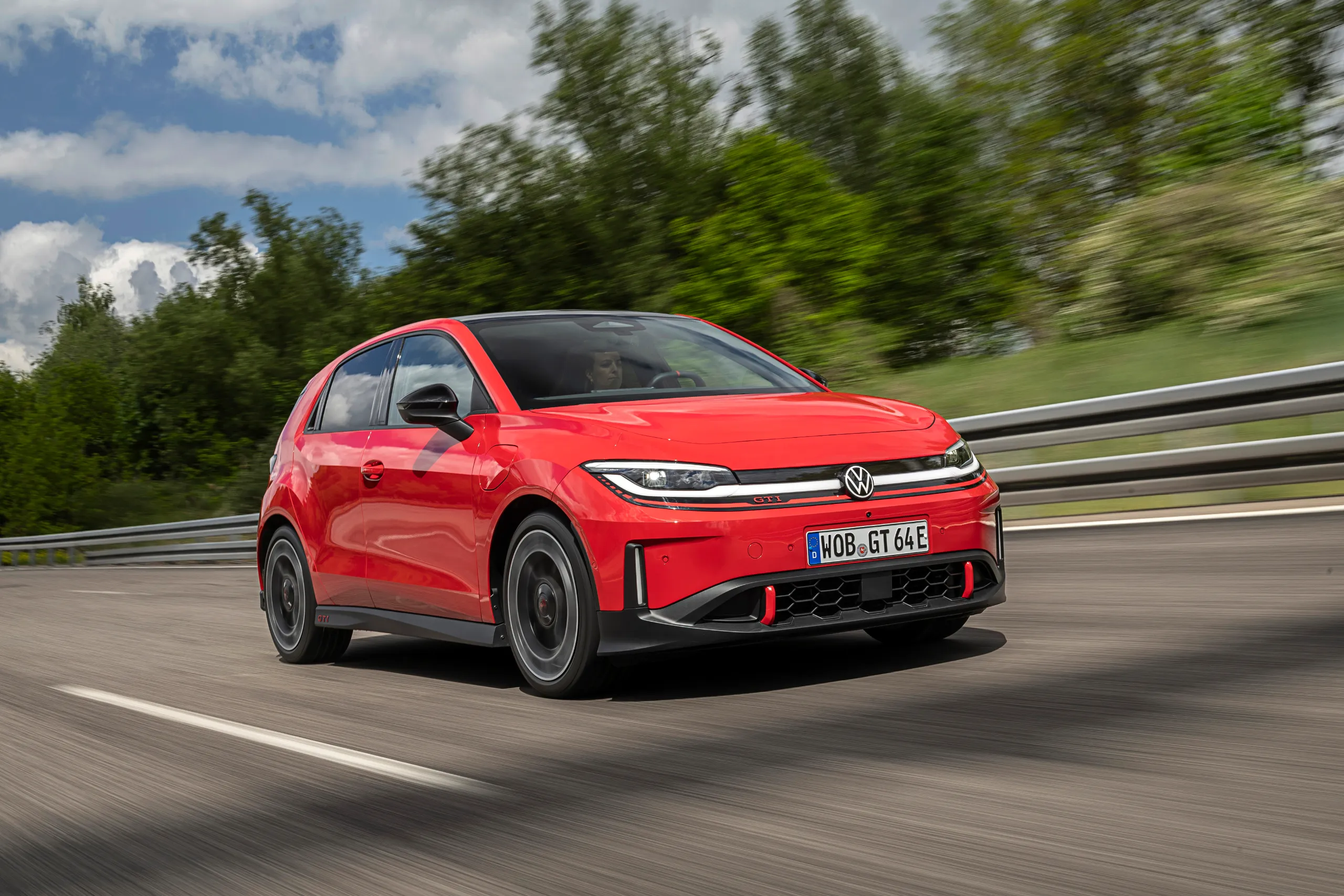 Volkswagen ID. Polo GTI electric hot hatch in red with honeycomb front grille and 19-inch alloy wheels