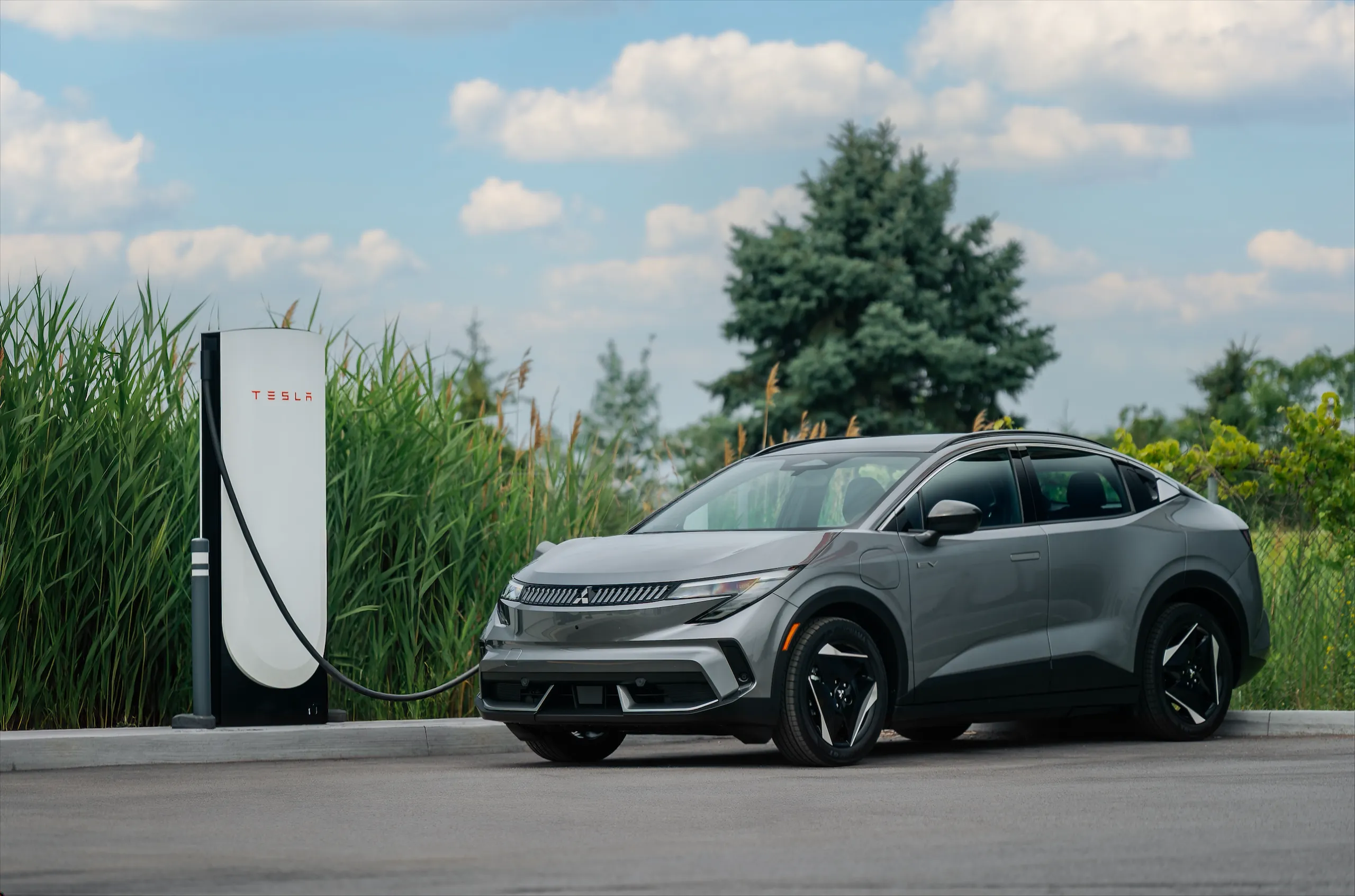 2027 Mitsubishi Eclipse Sportback DC Fast-Charging: 2027 Mitsubishi Eclipse Sportback EV connected to a DC fast charger